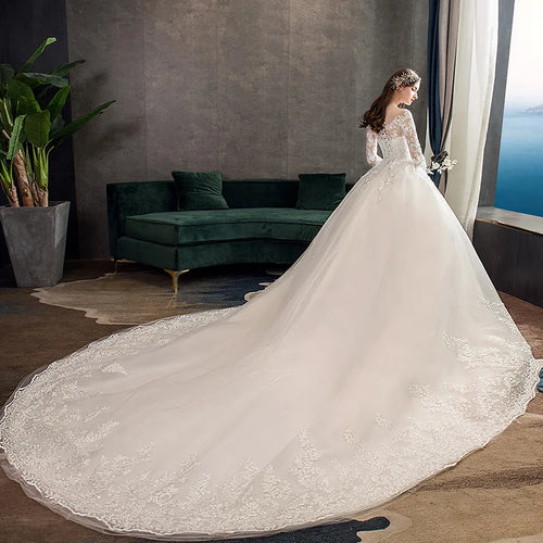 Enchanted Elegance: Long Wedding Dress for the New Bride